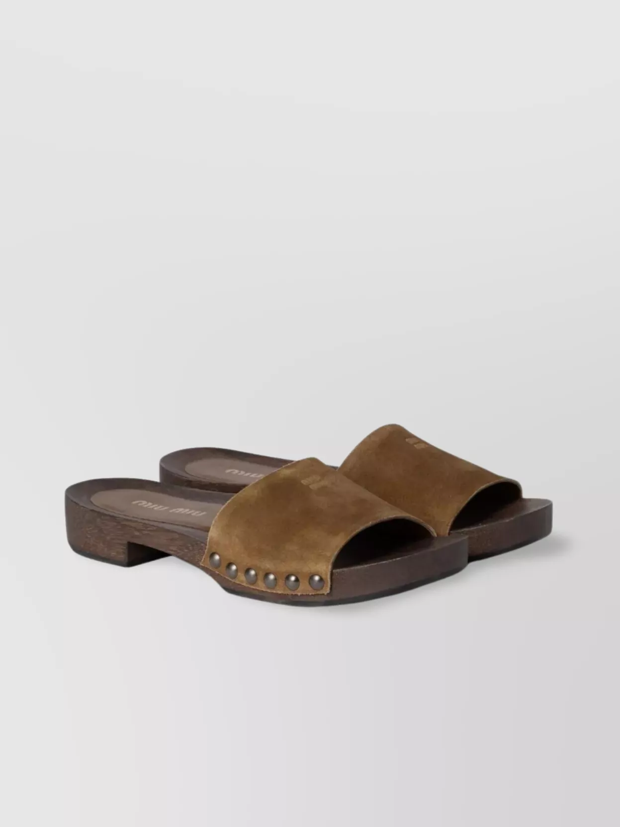 Shop Miu Miu Distressed Suede Clogs Featuring Studded Detail